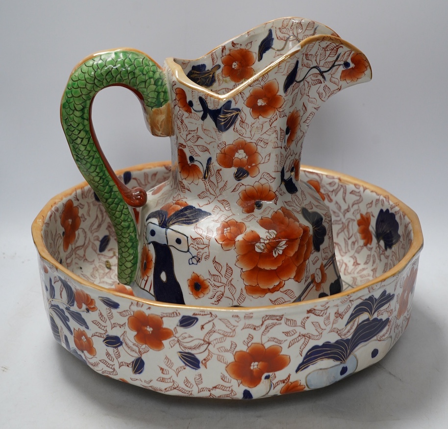 An ironstone style Hydra jug and bowl, together with two Royal Crown Derby dinner plates, jug 28cm high. Condition - poor